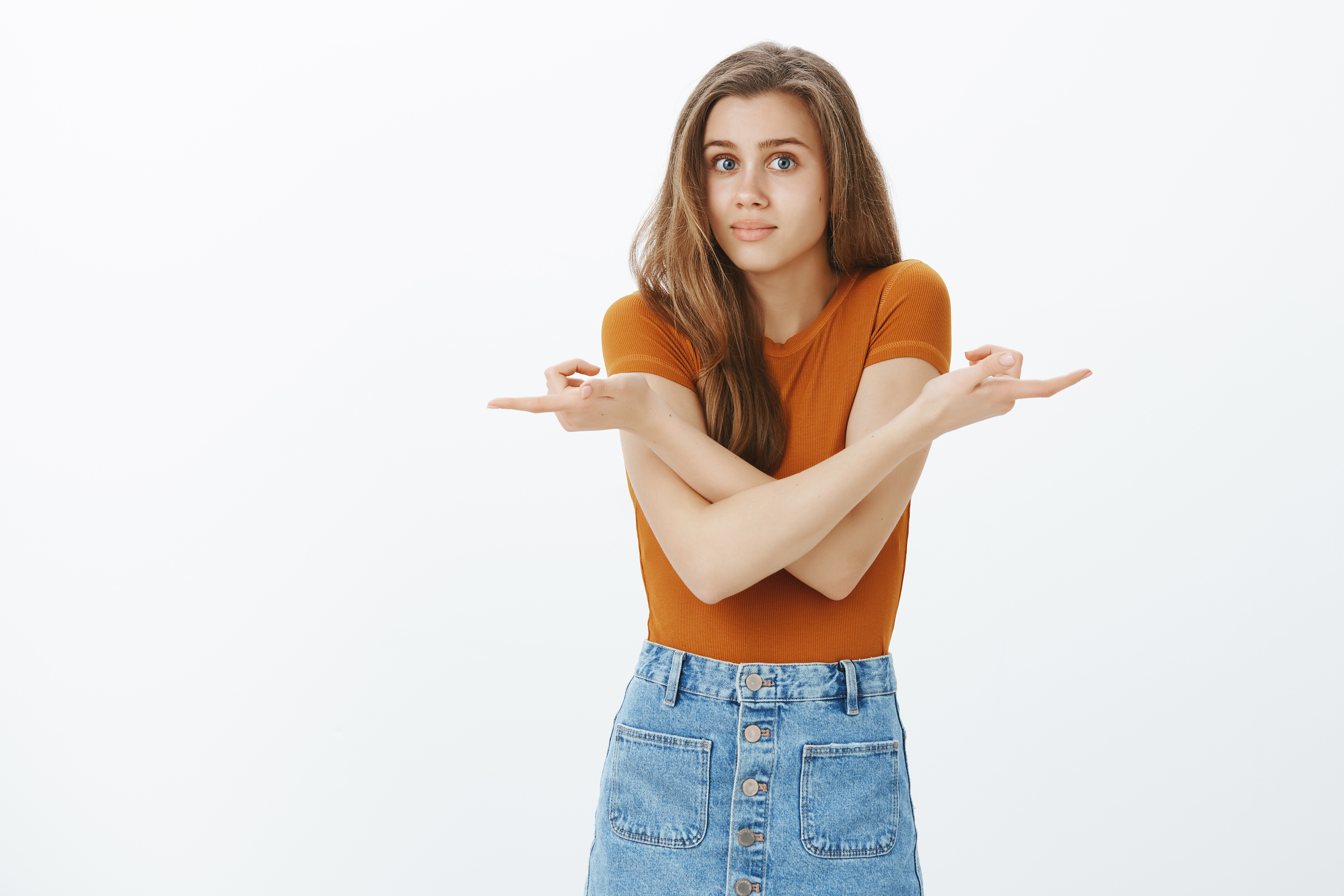 clueless-indecisive-beautiful-blond-girl-looking-confused-pointing-fingers-sideways-can-t-decide